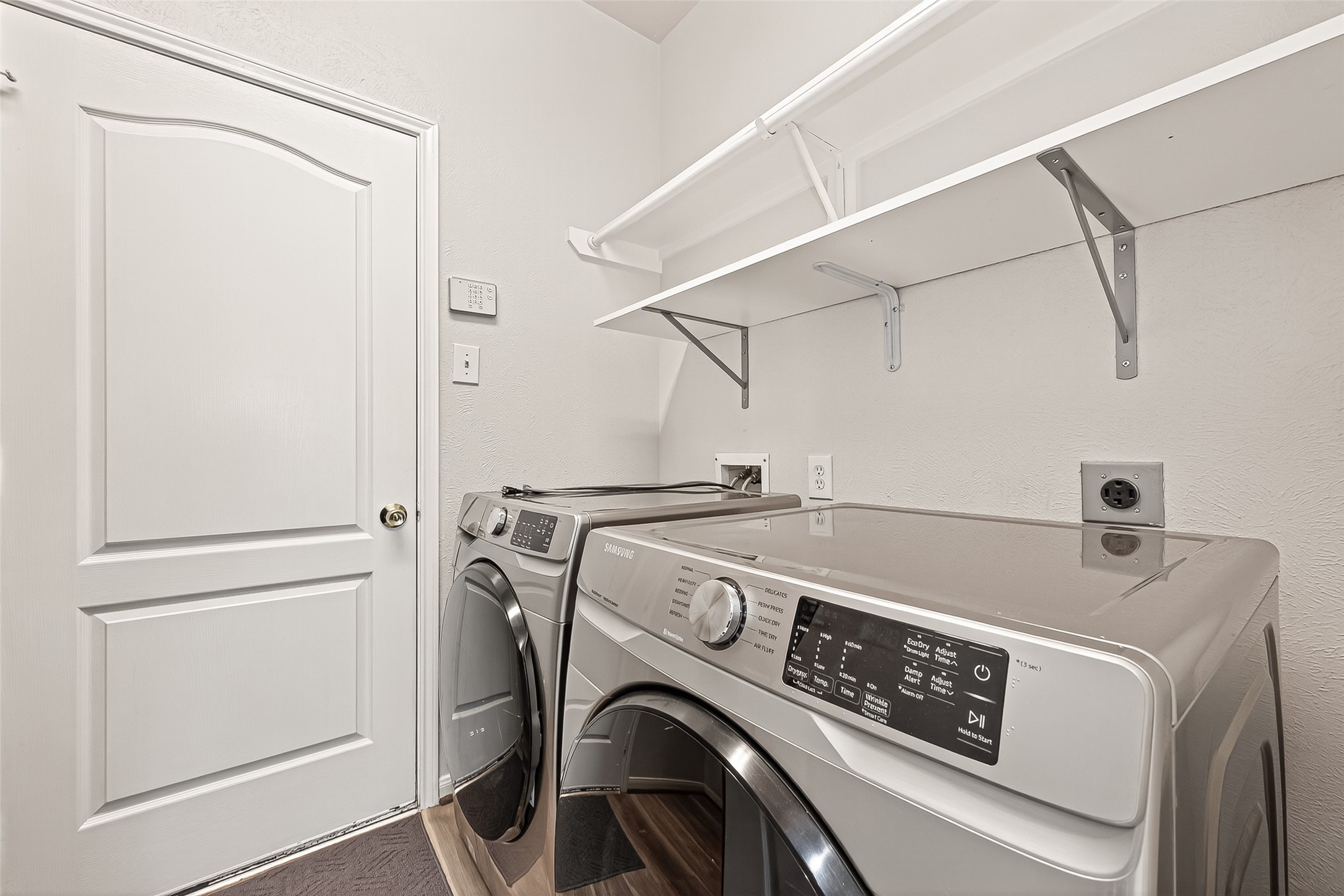 19343 Dickson Park Drive Spring, TX 77373 - Photo 29 of 49 a utility room with dryer and washer