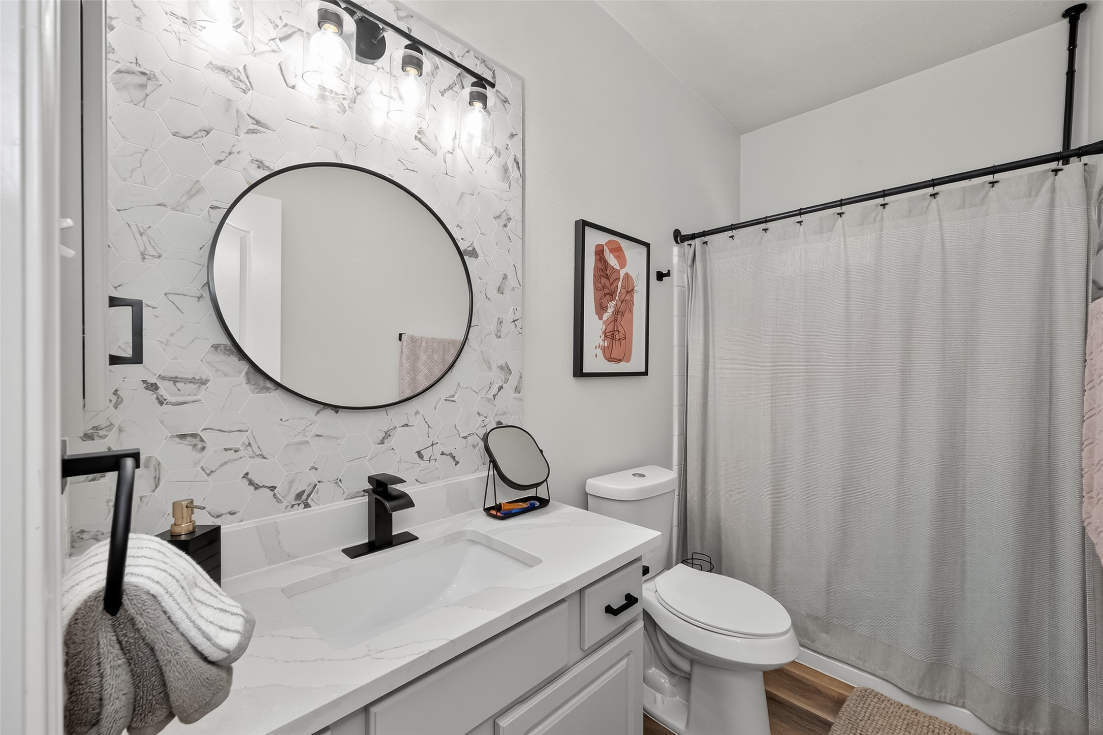 19343 Dickson Park Drive Spring, TX 77373 - Photo 32 of 49 a bathroom with a sink mirror and toilet