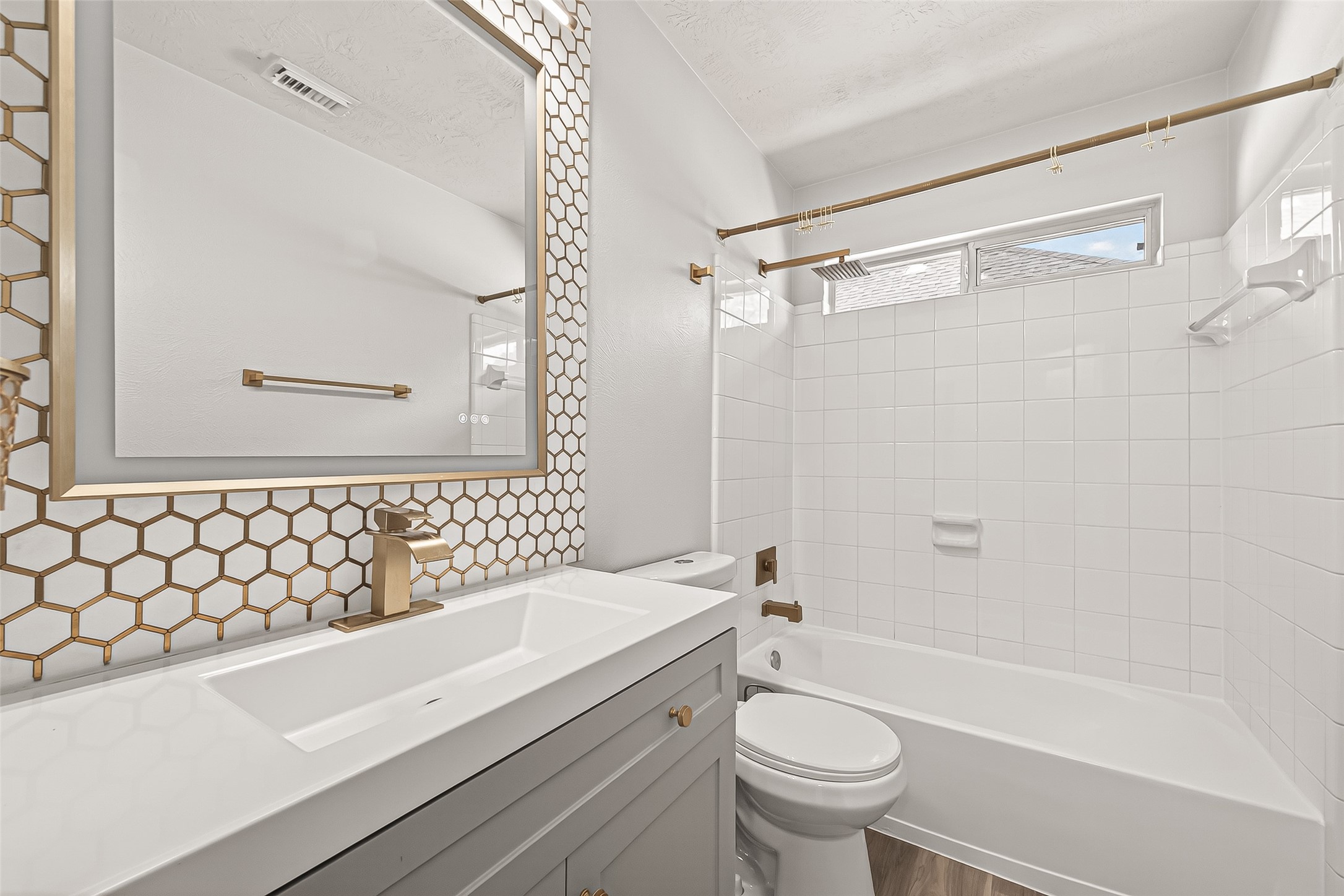 19343 Dickson Park Drive Spring, TX 77373 - Photo 37 of 49 a bathroom with a sink a toilet and a bathtub