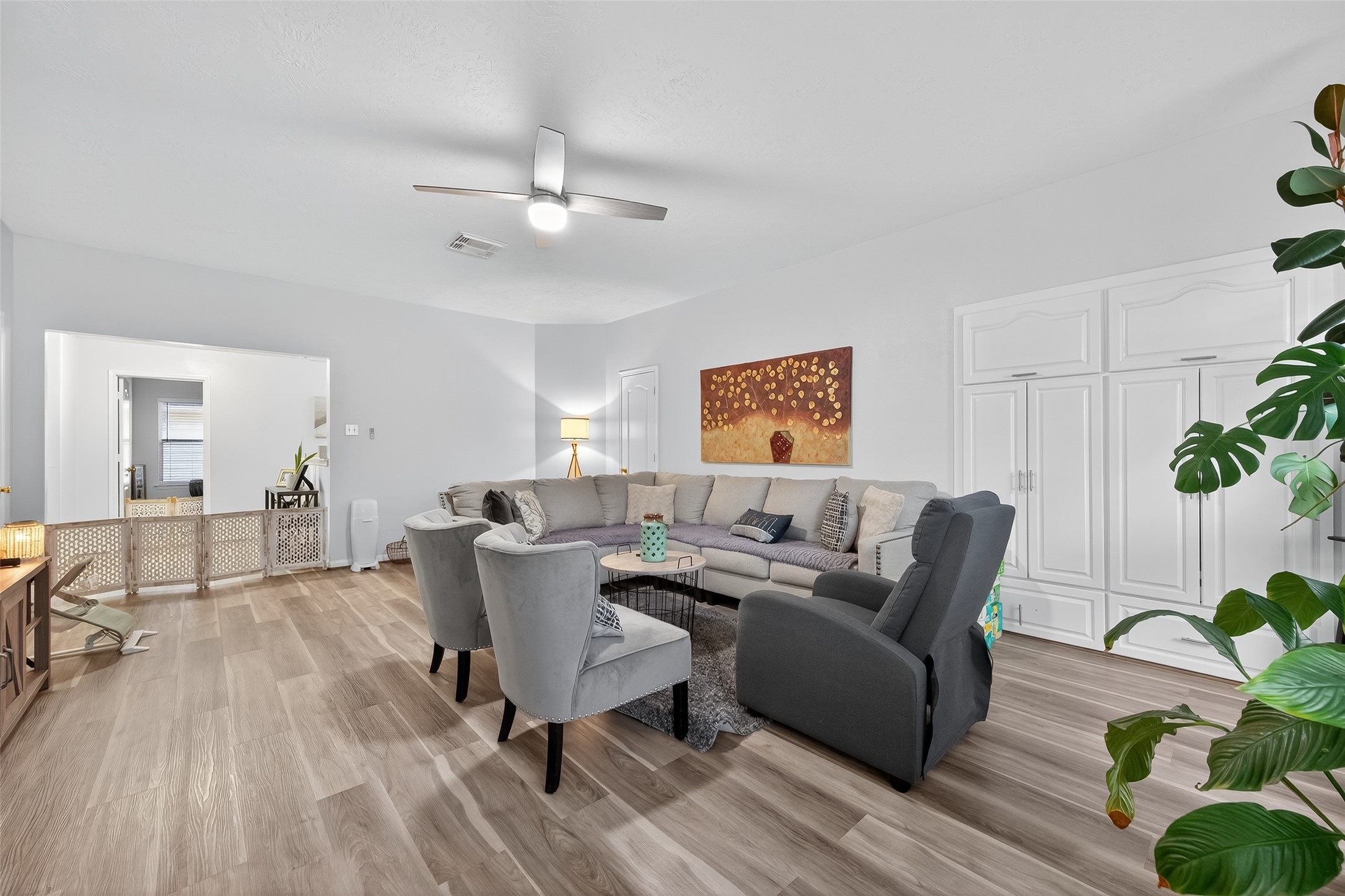 19343 Dickson Park Drive Spring, TX 77373 - Photo 40 of 49 a living room with furniture and a potted plant