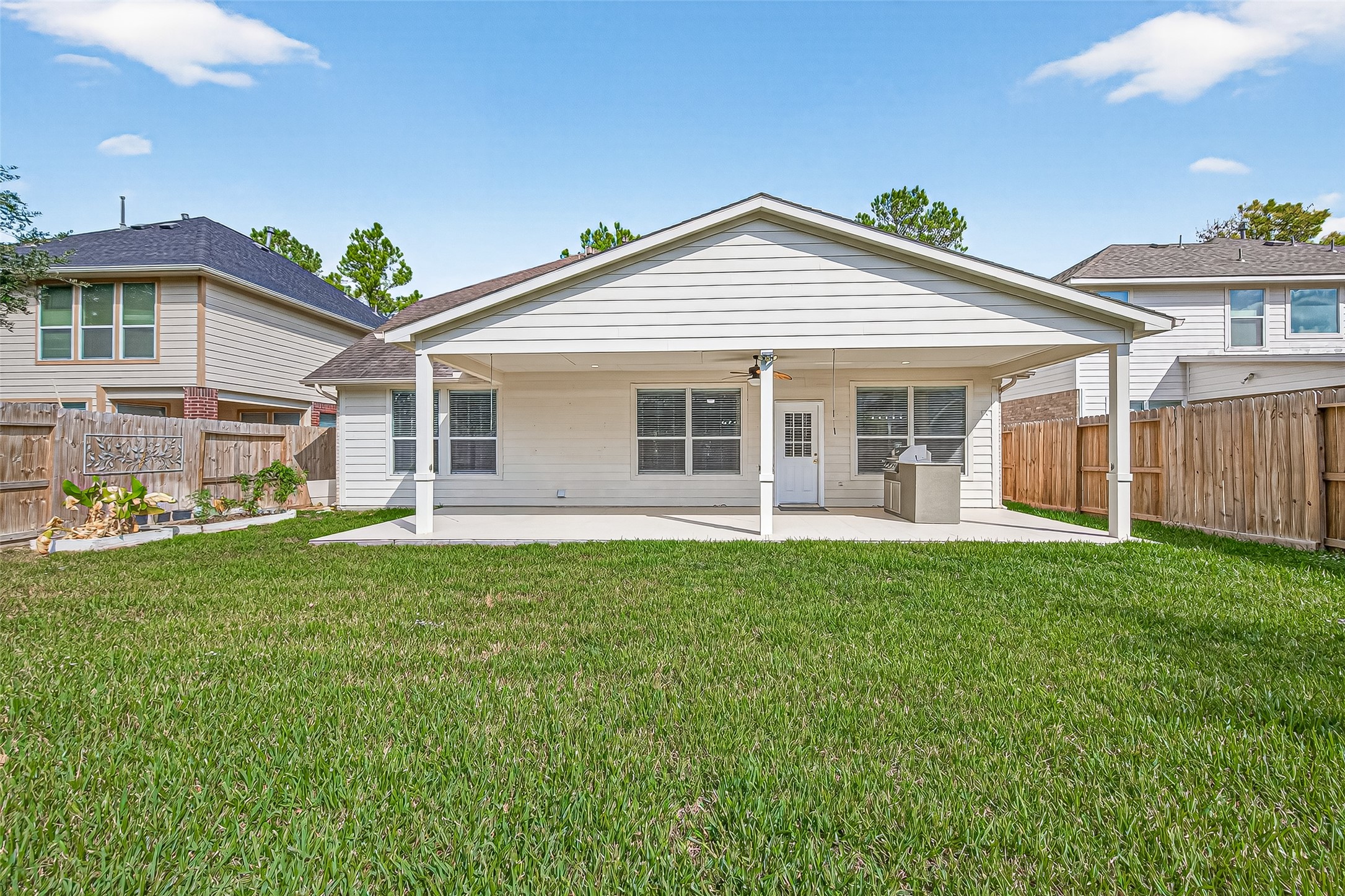 19343 Dickson Park Drive Spring, TX 77373 - Photo 49 of 49 a view of a house with a backyard