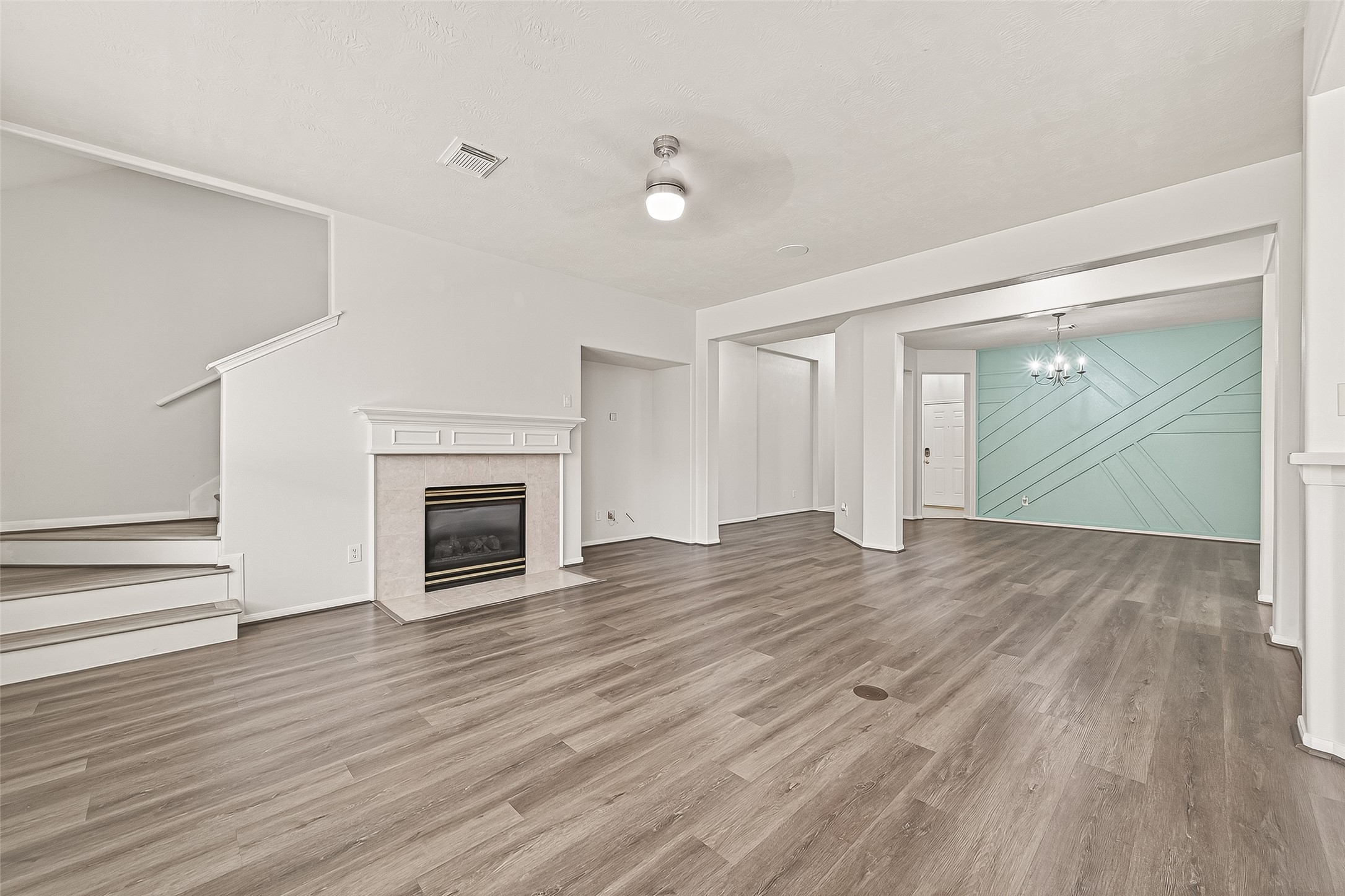 19343 Dickson Park Drive Spring, TX 77373 - Photo 10 of 49 wooden floor fireplace and natural light in room