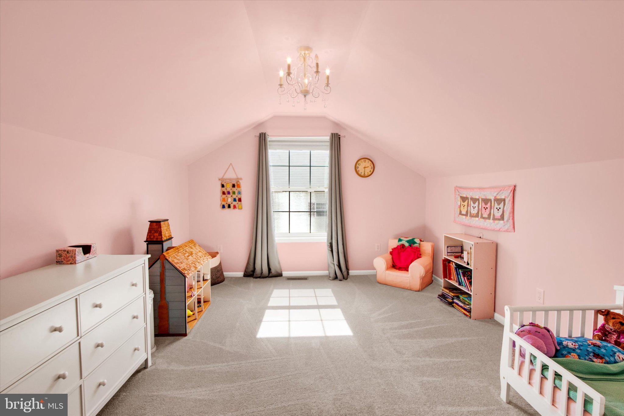 2514 Goddard Avenue Reading, PA 19608 - Photo 18 of 24 a bedroom with furniture and a chandelier