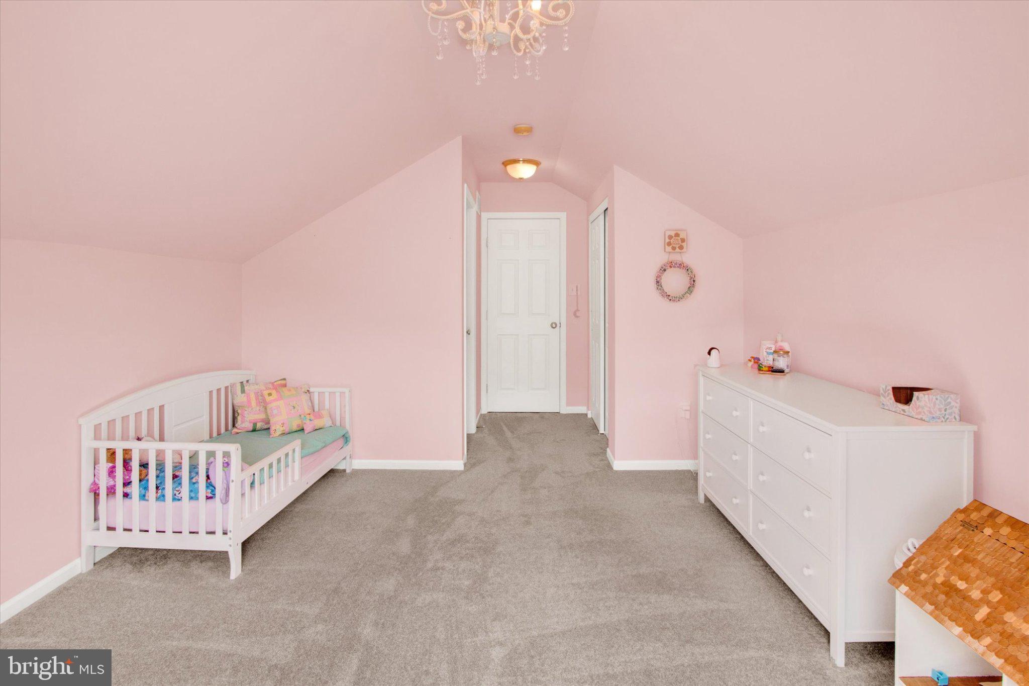 2514 Goddard Avenue Reading, PA 19608 - Photo 19 of 24 a view of a bedroom with wooden floor & a ceiling fan