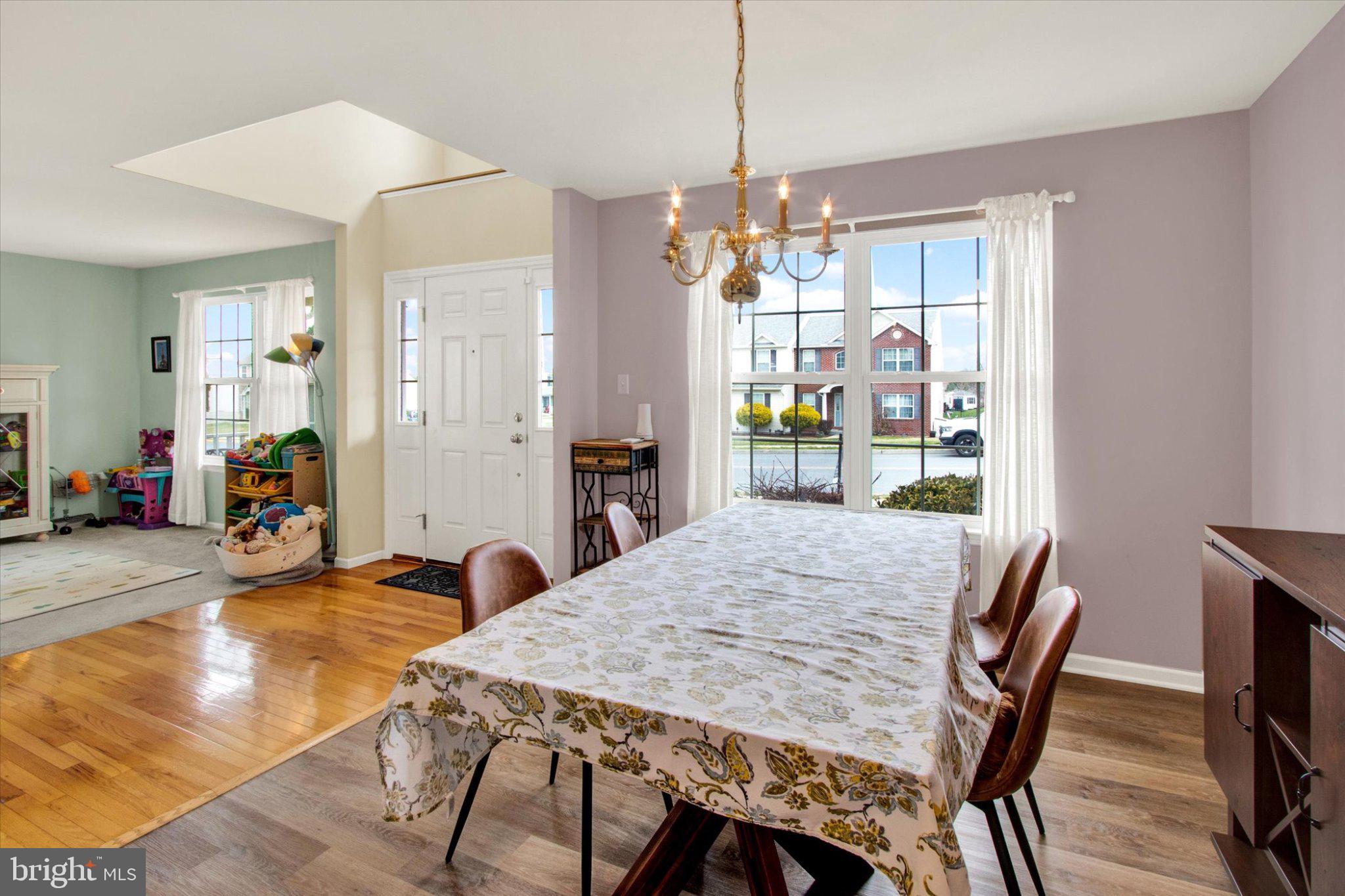 2514 Goddard Avenue Reading, PA 19608 - Photo 5 of 24 a view of a dining room with furniture window and wooden floor