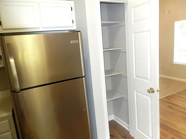 a close view of a refrigerator a window