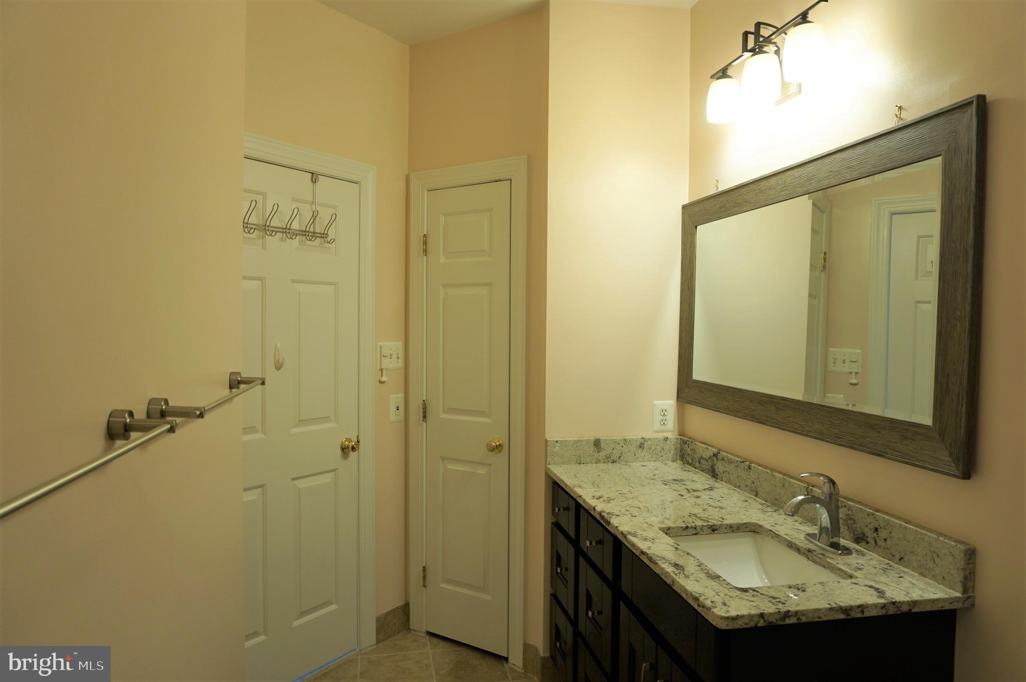 13923 Bromfield Road Germantown, MD 20874 - Photo 40 of 55 Hallway Bathroom