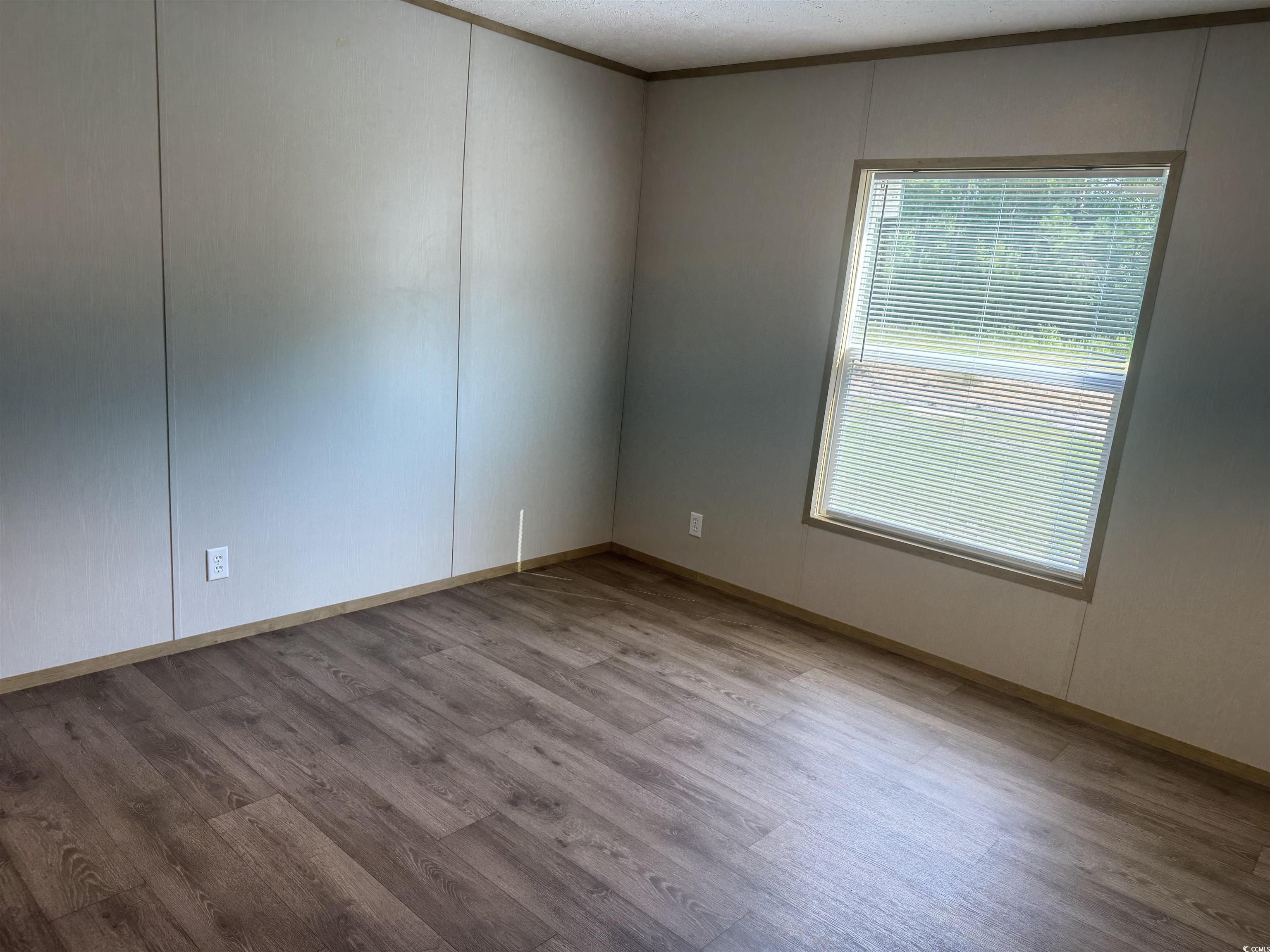 364 Jamie Road Galivants Ferry, SC 29544 - Photo 19 of 23 Unfurnished room with wood finished floors and bas