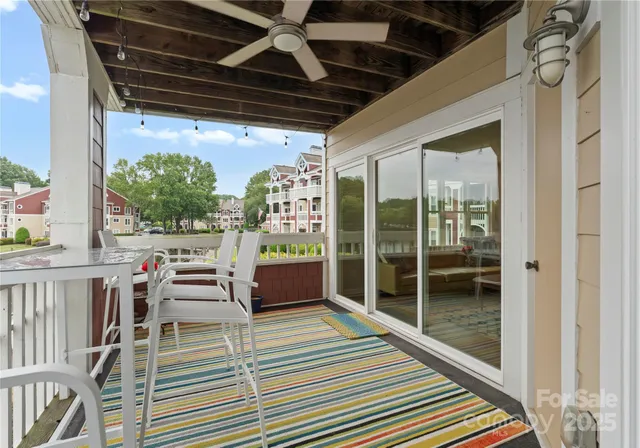 a view of a terrace next to a lake view