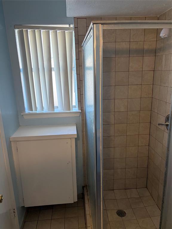 13360 Southview Lane Dallas, TX 75240 - Photo 11 of 26 a bathroom with a shower