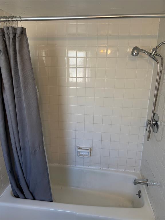 13360 Southview Lane Dallas, TX 75240 - Photo 12 of 26 a bathroom with a shower