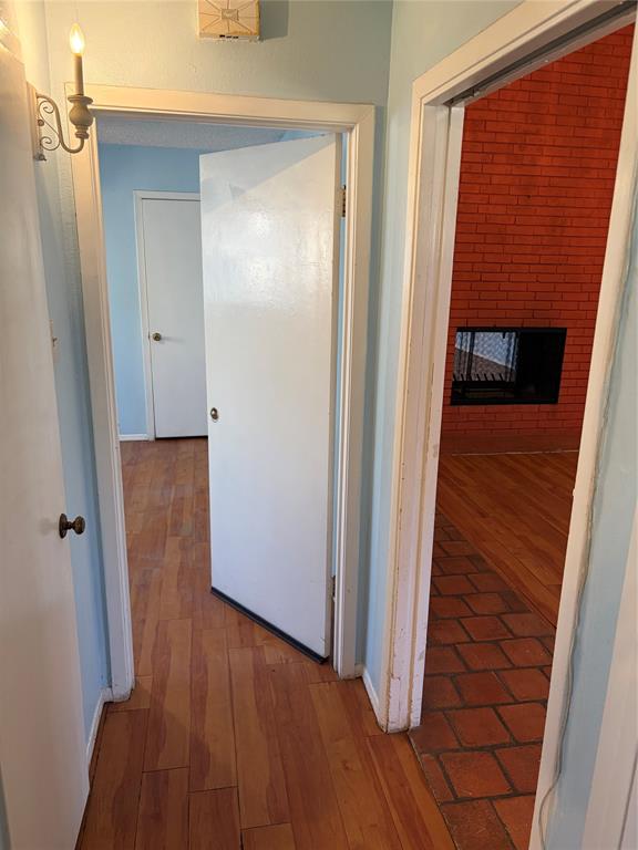 13360 Southview Lane Dallas, TX 75240 - Photo 13 of 26 wooden floor in a gallery