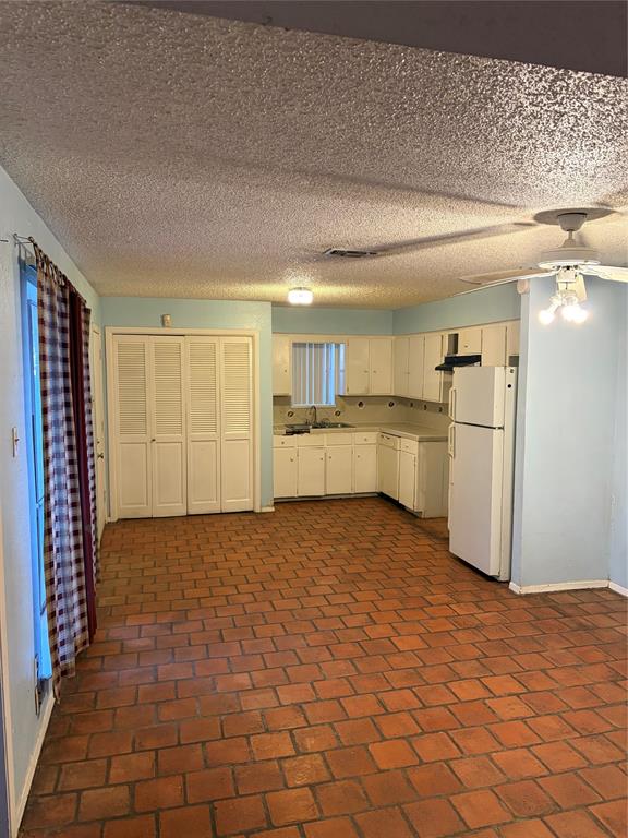 13360 Southview Lane Dallas, TX 75240 - Photo 6 of 26 a view of a kitchen with a oven