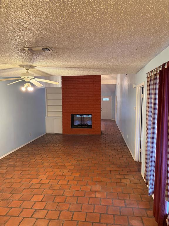 13360 Southview Lane Dallas, TX 75240 - Photo 8 of 26 a view of an empty room with a window