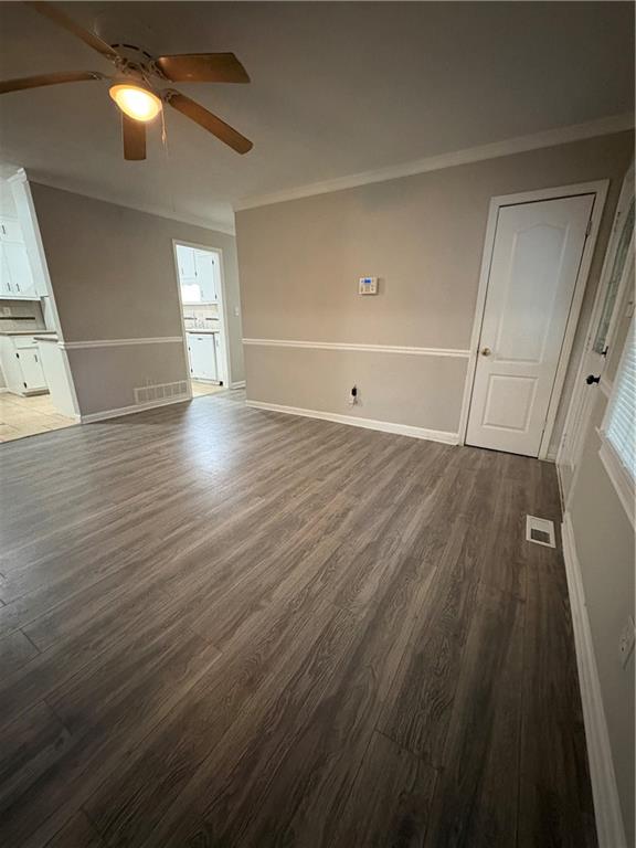 657 Utoy Court Jonesboro, GA 30238 - Photo 14 of 29 wooden floor in an empty room with a window