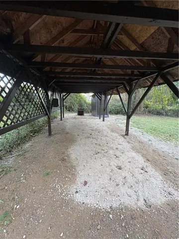 a view of porch with green space