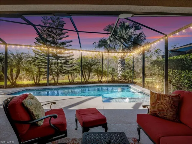 a view of patio with swimming pool