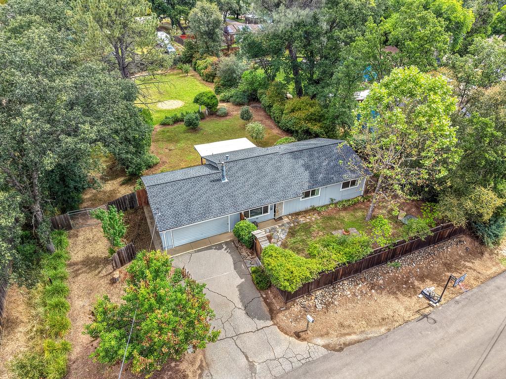 6689 Rhodes Avenue Placerville, CA 95667 - Photo 1 of 60 an aerial view of a house with a yard basket ball court and outdoor seating