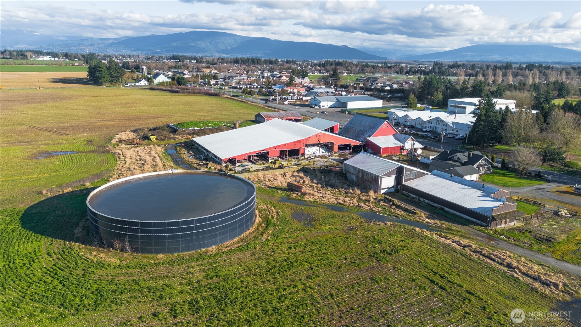0 East Badger Road Lynden, WA 98264 - Photo 13 of 34 a view of a swimming pool with outdoor seating and yard