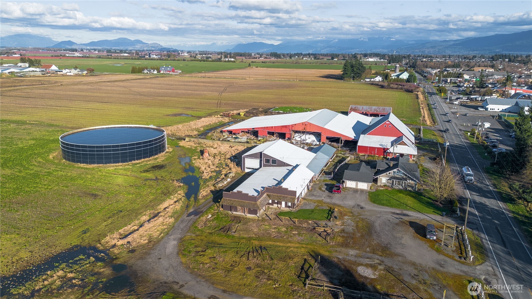 0 East Badger Road Lynden, WA 98264 - Photo 14 of 34 an aerial view of a houses with outdoor space