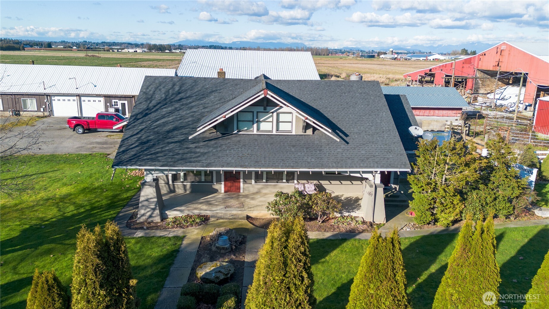 0 East Badger Road Lynden, WA 98264 - Photo 25 of 34 an aerial view of a house with a swimming pool