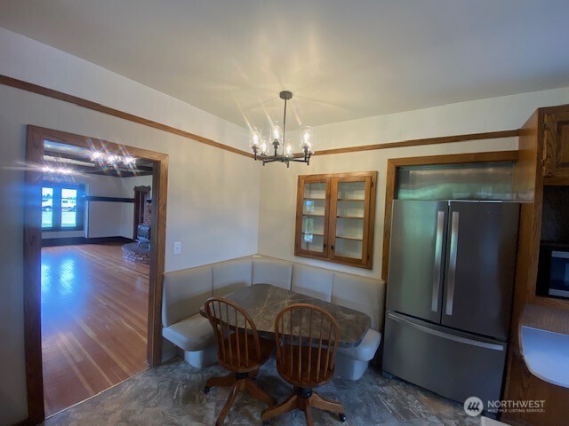 0 East Badger Road Lynden, WA 98264 - Photo 29 of 34 a view of a dining room with furniture and wooden floor