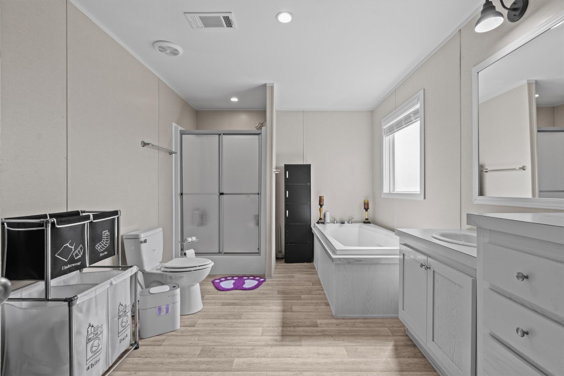 480 Grandpa Road Lockhart, TX 78644 - Photo 12 of 32 a bathroom with a sink toilet and shower