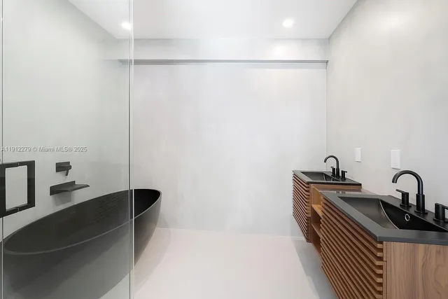 a kitchen with a sink and a refrigerator