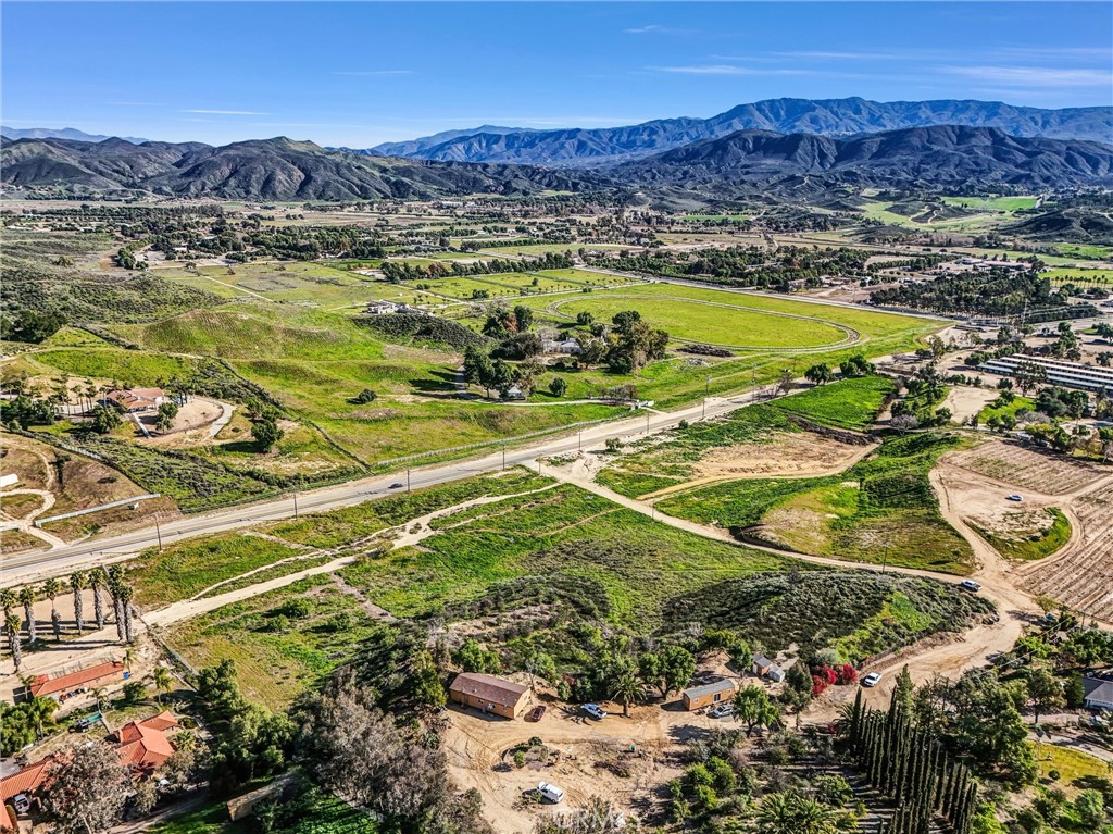 42780 India Place Temecula, CA 92592 - Photo 5 of 16 a view of a water yard and mountain view