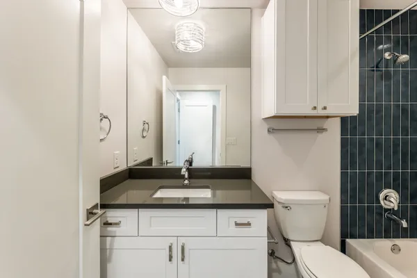 a bathroom with a sink and a toilet