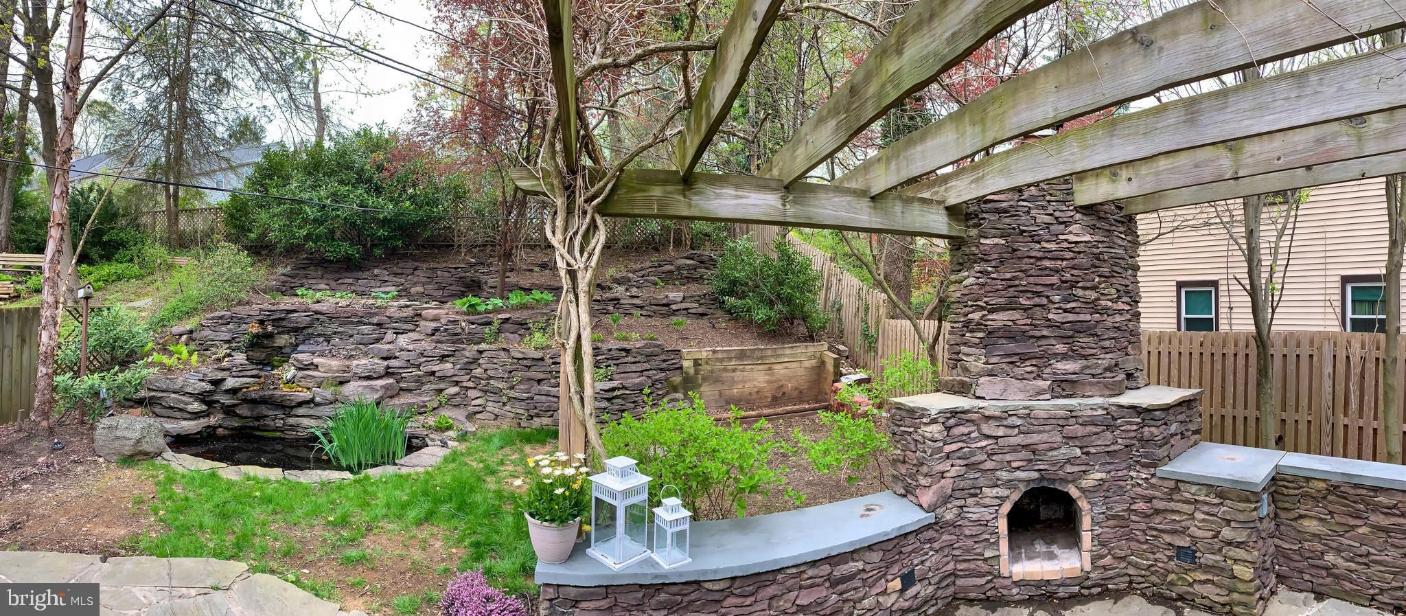 107 East Knowlton Road Media, PA 19063 - Photo 33 of 39 Stone Fireplace, Pergola and Tiered Garden Space