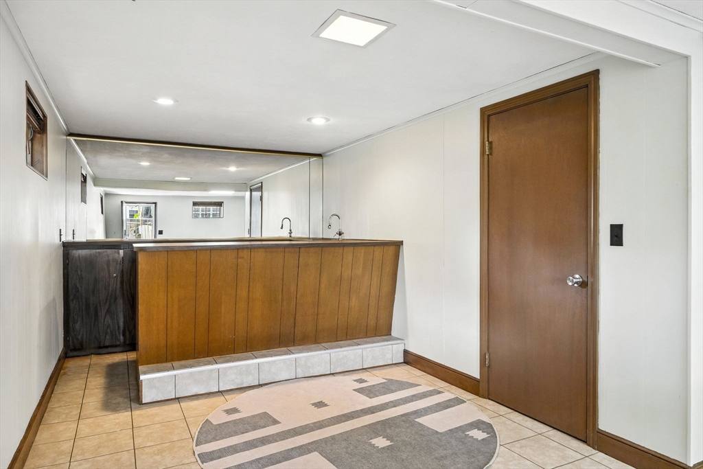 5 Yorkshire Road Marblehead, MA 01945 - Photo 27 of 37 a view of a hallway with wooden floor