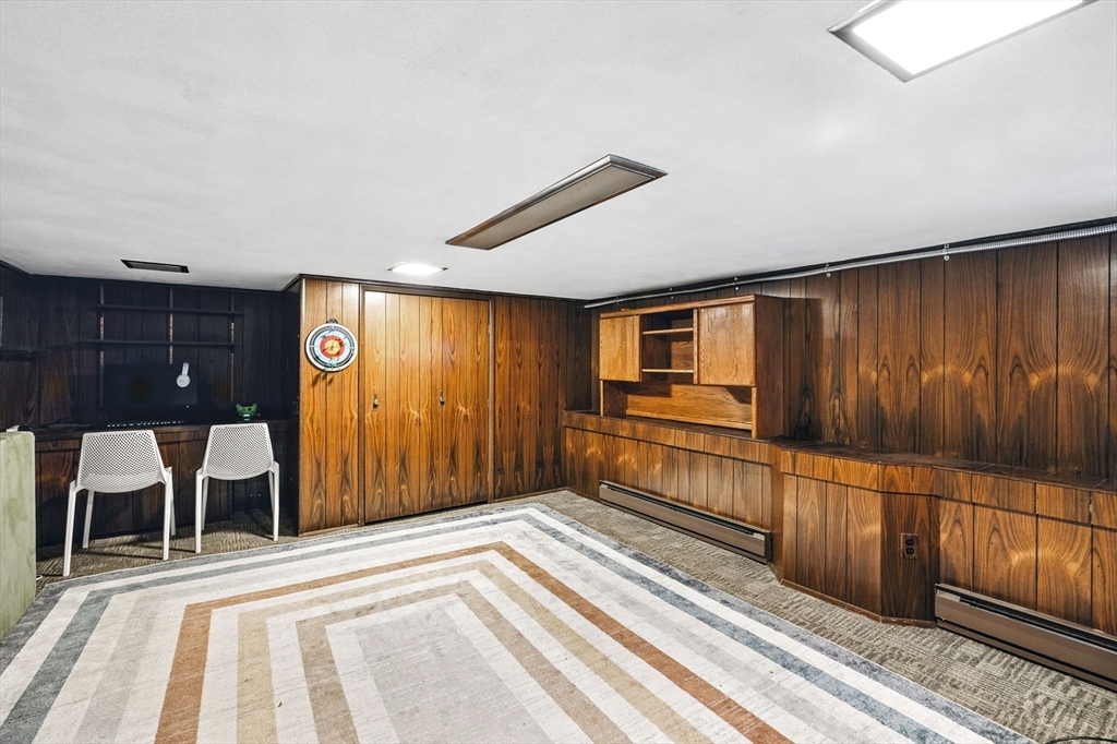 5 Yorkshire Road Marblehead, MA 01945 - Photo 29 of 37 a view of a room with furniture and wooden floor