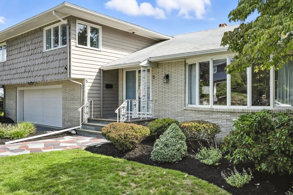 5 Yorkshire Road Marblehead, MA 01945 - Photo 31 of 37 a front view of a house with a yard and garage