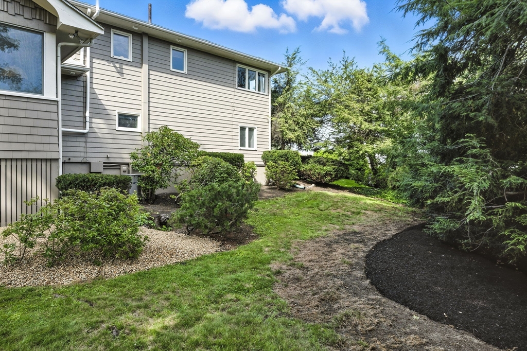 5 Yorkshire Road Marblehead, MA 01945 - Photo 36 of 37 a view of a back yard of the house