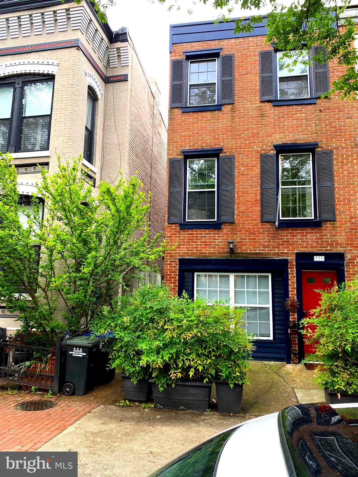 339 11th Street Southeast Washington, DC 20003 - Photo 1 of 39 a view of a brick building with potted plants