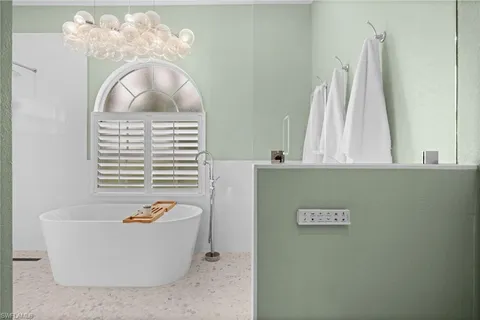 a view of a bathtub in a bathroom