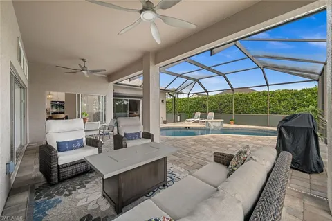 a view of pool with outdoor seating