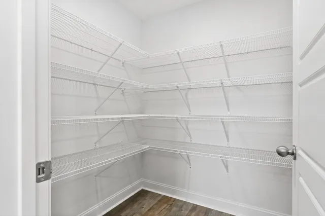 a view of a room with racks on the wall