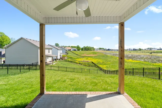 a view of an ocean with a swimming pool and outdoor space
