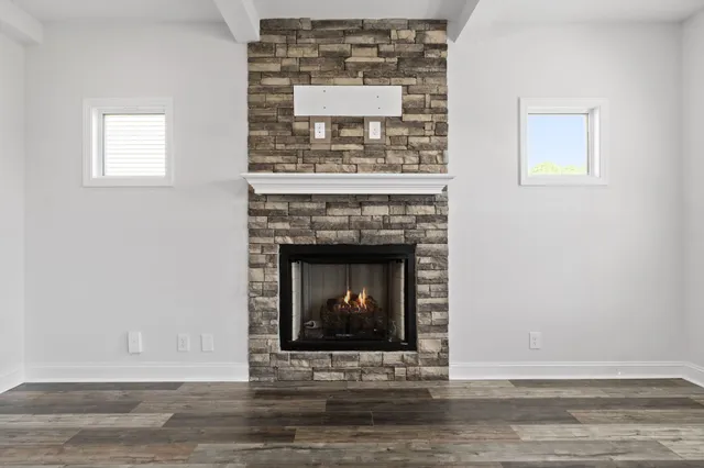 a living room with a fireplace