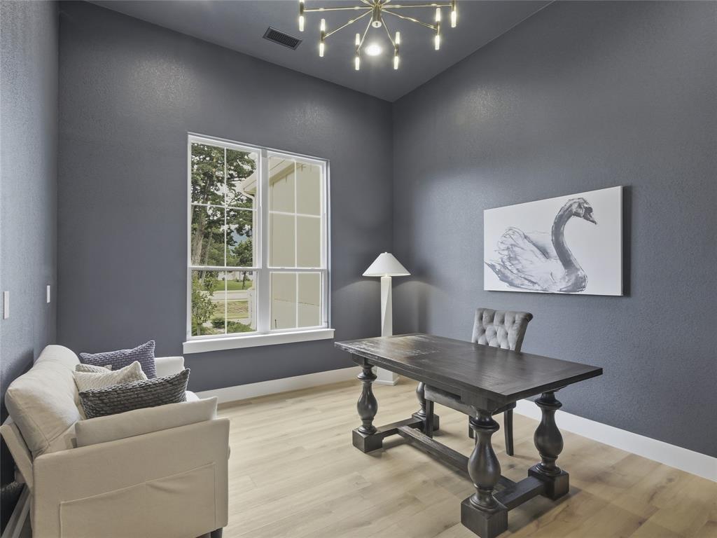 4211 Azalea Way Midlothian, TX 76065 - Photo 7 of 39 Spacious home office featuring light wood-finish flooring, high ceilings, and a modern chandelier
