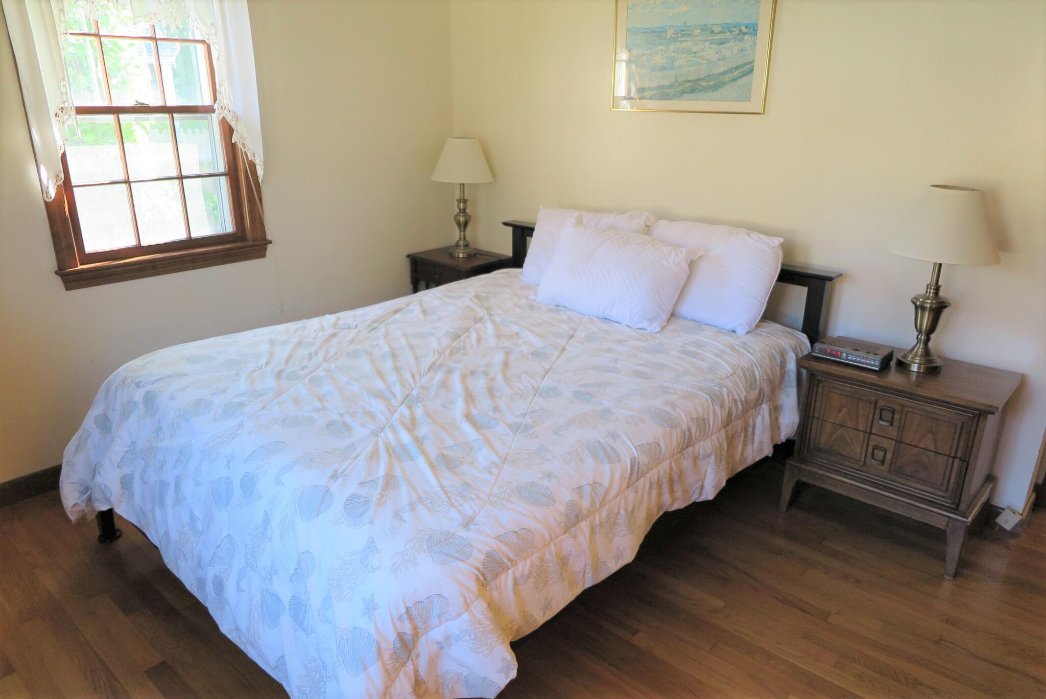 139 Captain Chase Road Dennis Port, MA 02639 - Photo 11 of 32 a bedroom with bed and window