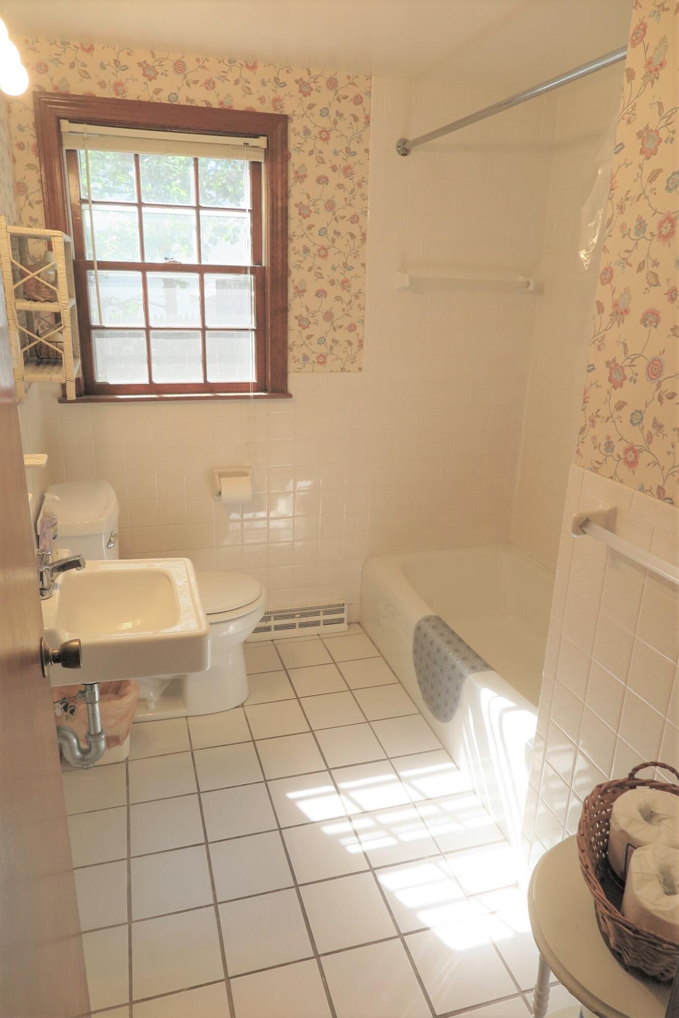 139 Captain Chase Road Dennis Port, MA 02639 - Photo 19 of 32 a bathroom with a bathtub and a toilet