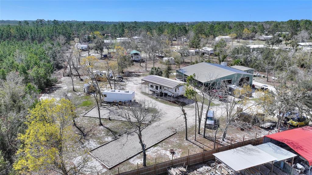 19550 Jody Morgan Road Perry, FL 32348 - Photo 12 of 79 a view of a terrace with a table and chairs
