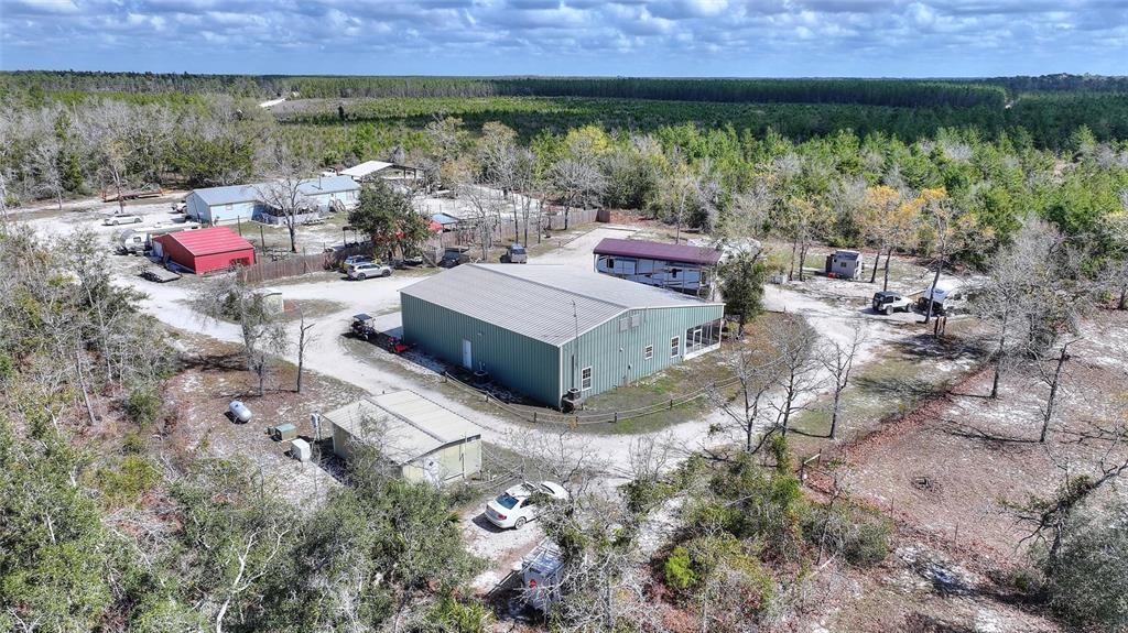 19550 Jody Morgan Road Perry, FL 32348 - Photo 17 of 79 a outdoor living space with furniture and garden view