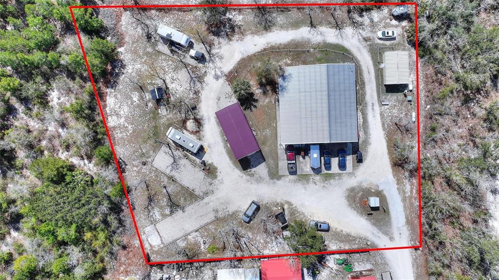 19550 Jody Morgan Road Perry, FL 32348 - Photo 27 of 79 an aerial view of residential houses with outdoor space