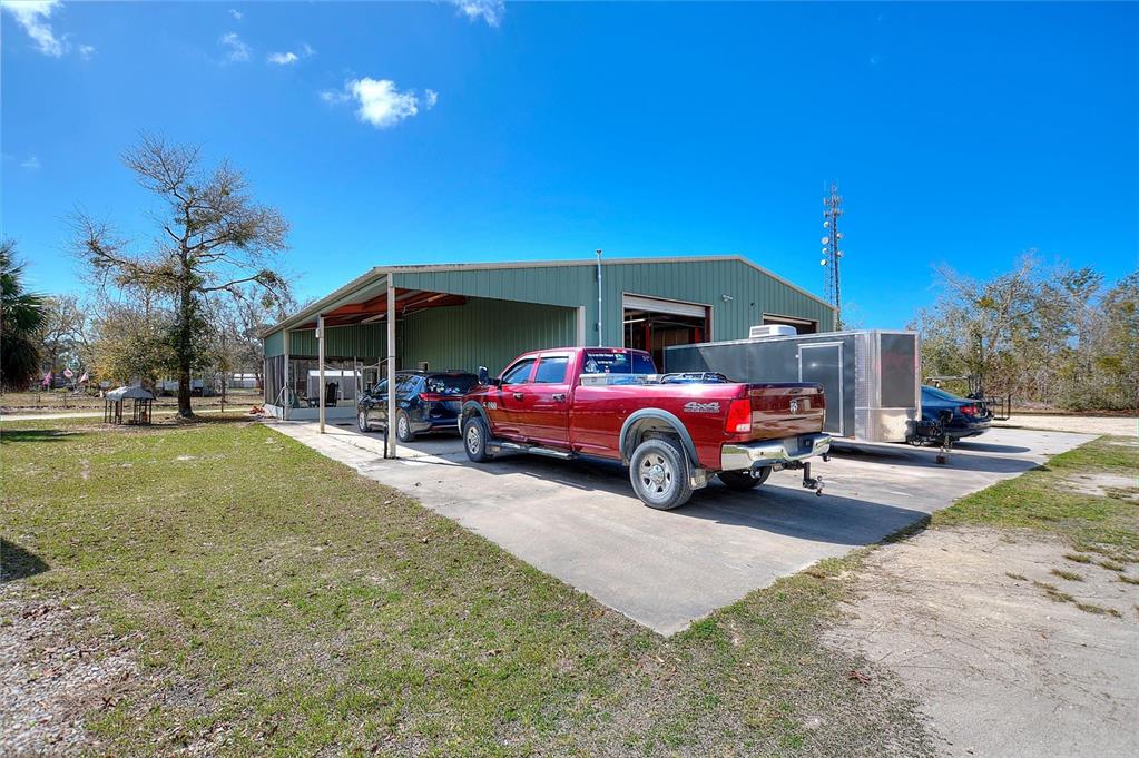 19550 Jody Morgan Road Perry, FL 32348 - Photo 33 of 79 a view of a house with a yard