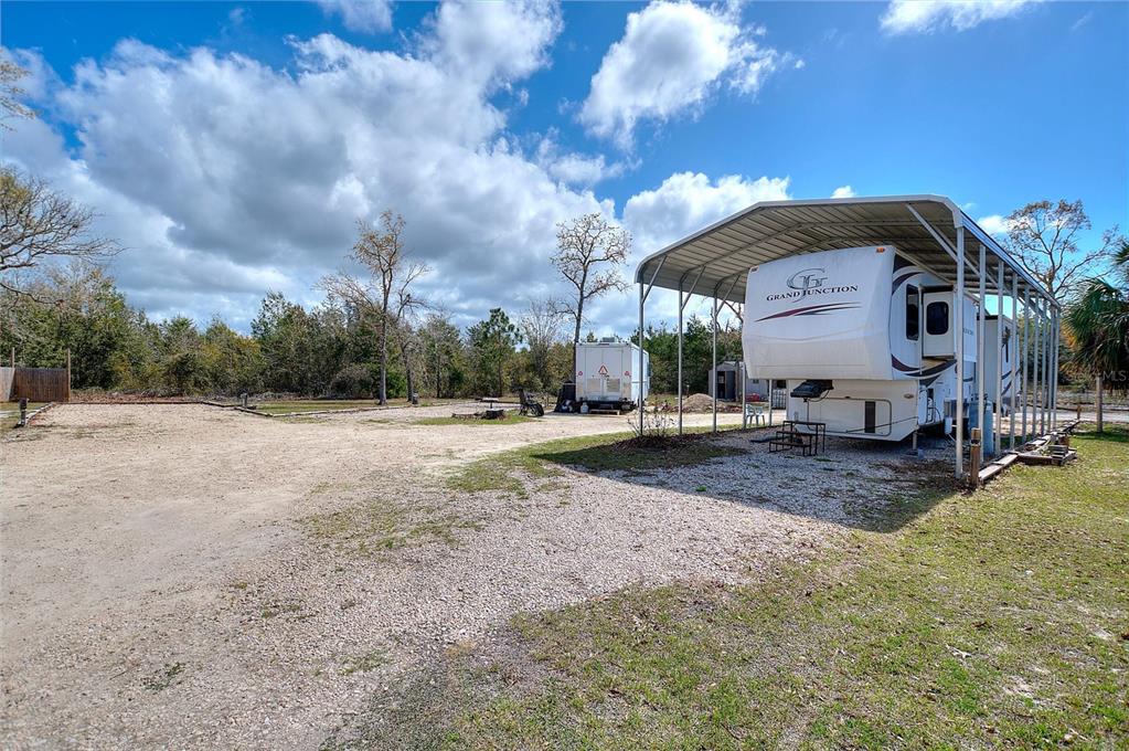 19550 Jody Morgan Road Perry, FL 32348 - Photo 34 of 79 a view of a house with a yard