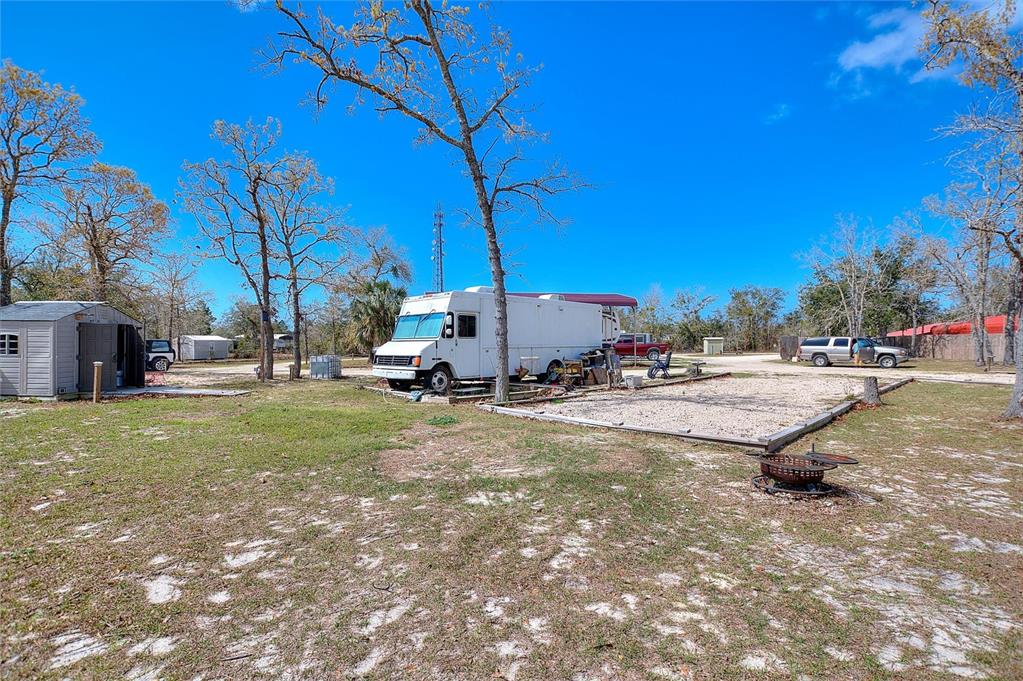 19550 Jody Morgan Road Perry, FL 32348 - Photo 37 of 79 a view of outdoor space with garden and tree